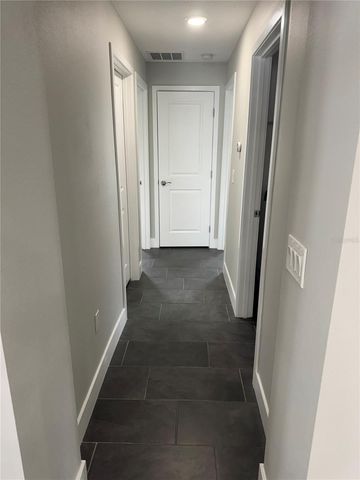 8544 BLACKBERRY AVENUE, Orlando, FL 32825