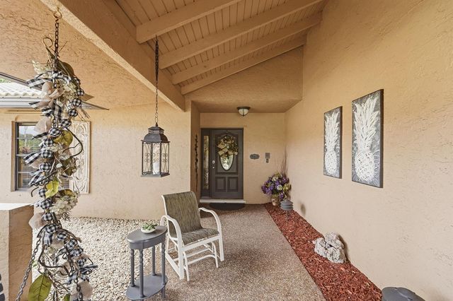 2490 Deer Creek Lob Lolly Lane, Deerfield Beach, FL 33442
