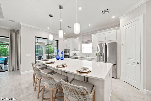 8884 Scarlotti PL, Naples, FL 34119