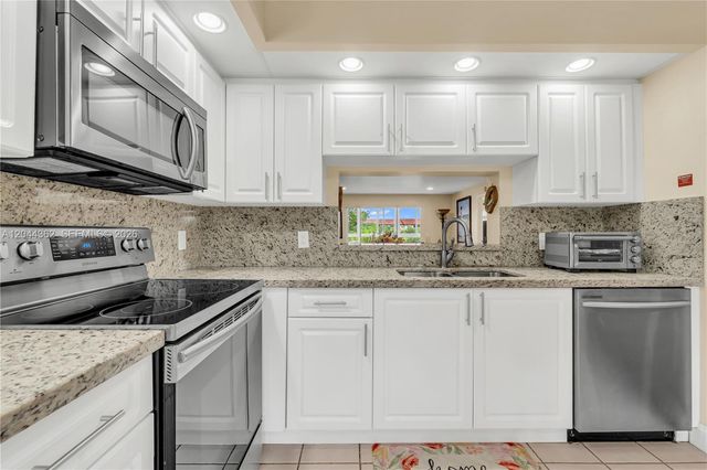 12900 SW 13th Street 309E, Pembroke Pines, FL 33027
