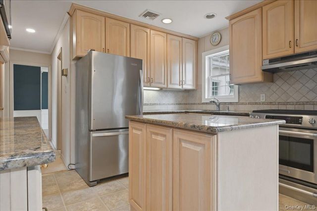 95 Pacific Street, Massapequa Park, NY 11762