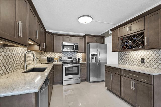 12650 SW 6th St 101K, Pembroke Pines, FL 33027