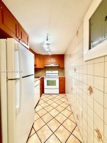 4717 NW 7th St 705-10, Miami, FL 33126