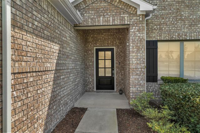 9702 Migrant Hawker Court, Conroe, TX 77385