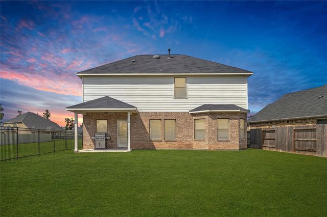 9702 Migrant Hawker Court, Conroe, TX 77385