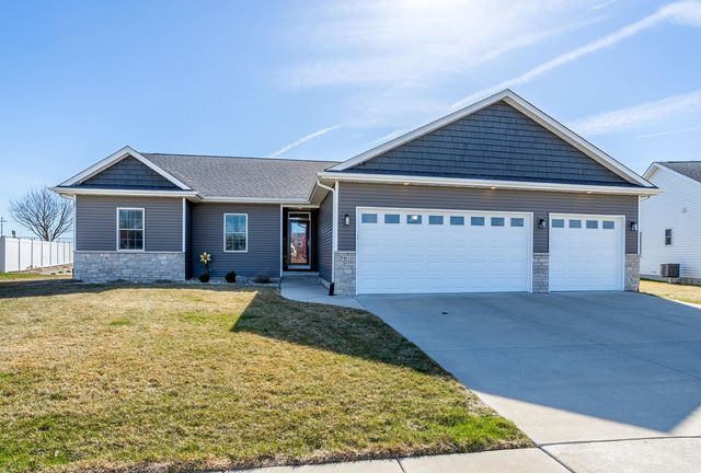 761 Sweet Wood Lane, Blue Grass, IA 52726