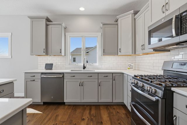 761 Sweet Wood Lane, Blue Grass, IA 52726