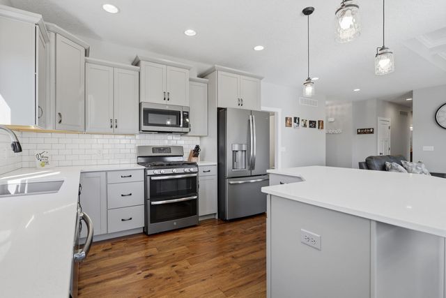 761 Sweet Wood Lane, Blue Grass, IA 52726