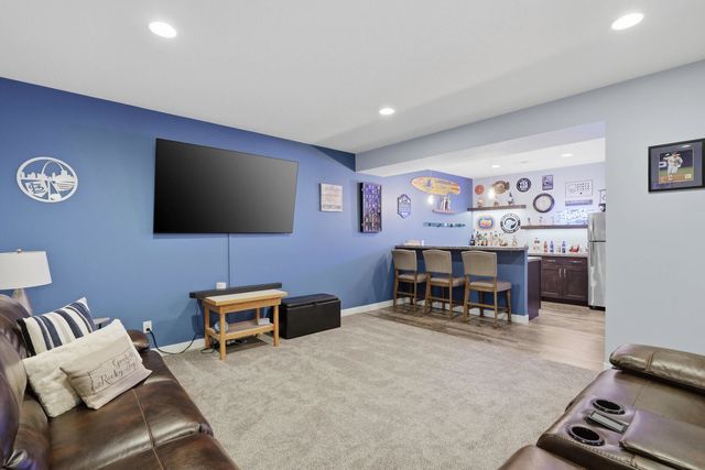 761 Sweet Wood Lane, Blue Grass, IA 52726