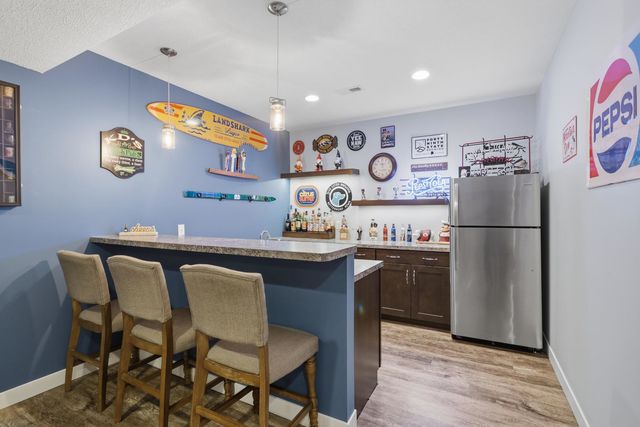 761 Sweet Wood Lane, Blue Grass, IA 52726