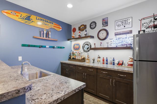 761 Sweet Wood Lane, Blue Grass, IA 52726