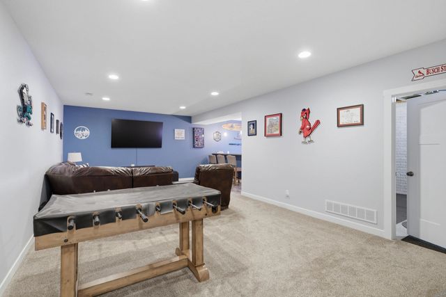 761 Sweet Wood Lane, Blue Grass, IA 52726