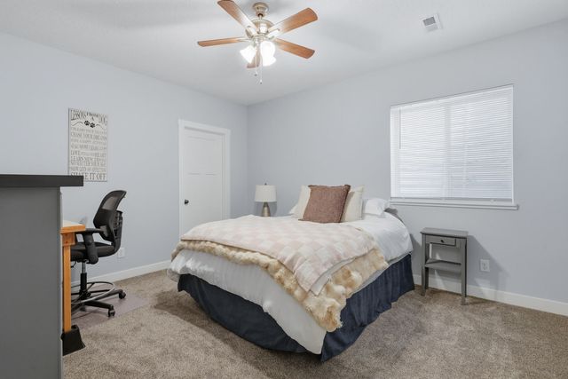 761 Sweet Wood Lane, Blue Grass, IA 52726