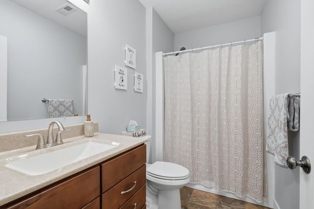 761 Sweet Wood Lane, Blue Grass, IA 52726