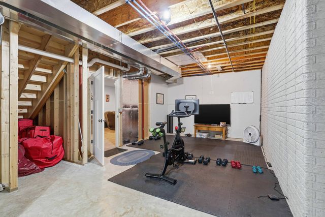 761 Sweet Wood Lane, Blue Grass, IA 52726