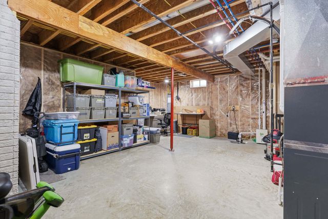 761 Sweet Wood Lane, Blue Grass, IA 52726