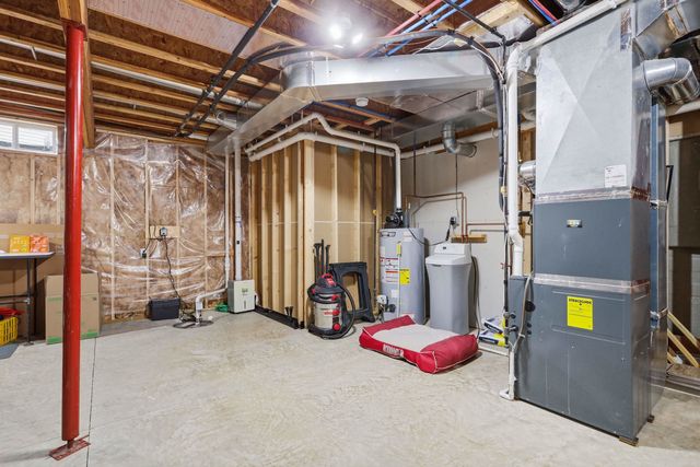 761 Sweet Wood Lane, Blue Grass, IA 52726