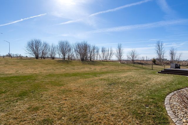 761 Sweet Wood Lane, Blue Grass, IA 52726