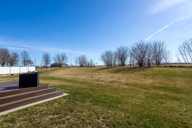 761 Sweet Wood Lane, Blue Grass, IA 52726