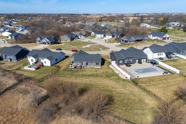 761 Sweet Wood Lane, Blue Grass, IA 52726