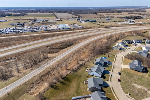 761 Sweet Wood Lane, Blue Grass, IA 52726