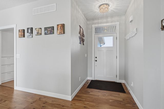 761 Sweet Wood Lane, Blue Grass, IA 52726