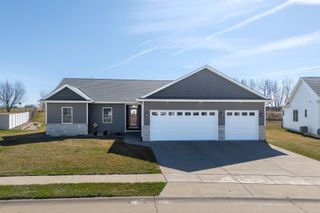 761 Sweet Wood Lane, Blue Grass, IA 52726