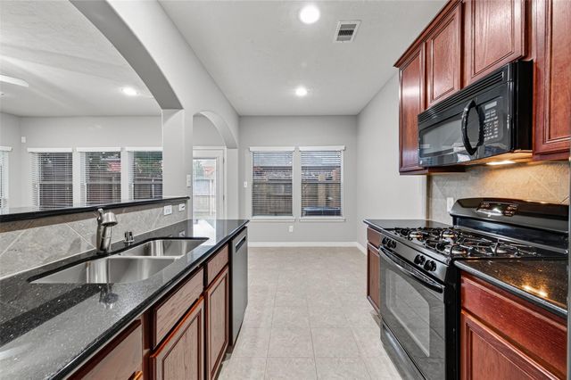 8910 Minola Oaks Drive, Houston, TX 77064