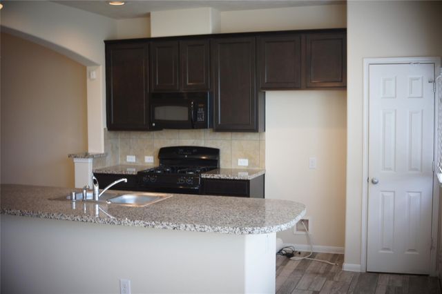 1619 Grable Cove Lane, Spring, TX 77379