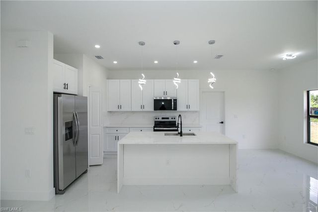 945 Commodore ST, Lehigh Acres, FL 33974