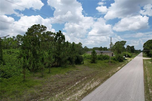 980 LAKESIDE DRIVE, Lehigh Acres, FL 33974