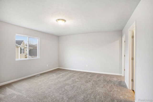3169 Wild Orchid Lane, Burton, MI 48519
