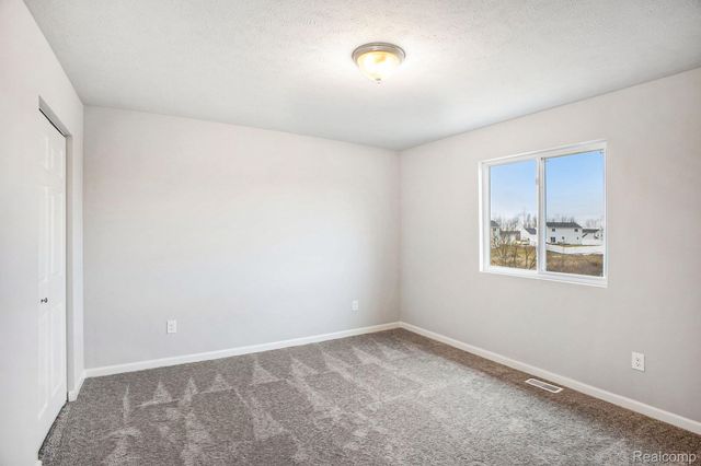 3169 Wild Orchid Lane, Burton, MI 48519