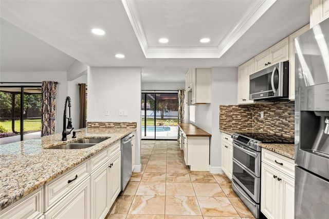 11201 RAINBOW WOODS LOOP, Spring Hill, FL 34609