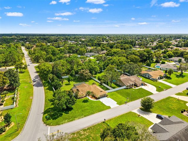11201 RAINBOW WOODS LOOP, Spring Hill, FL 34609