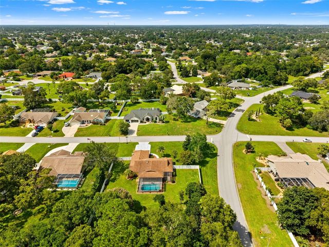 11201 RAINBOW WOODS LOOP, Spring Hill, FL 34609