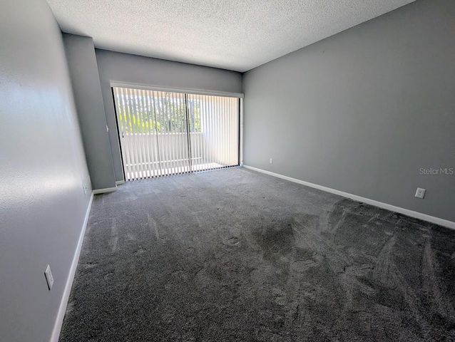 8707 BARDMOOR PLACE 202, Seminole, FL 33777