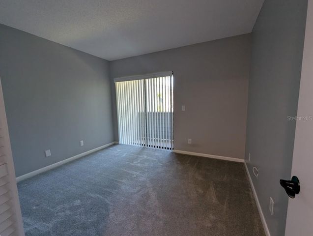 8707 BARDMOOR PLACE 202, Seminole, FL 33777