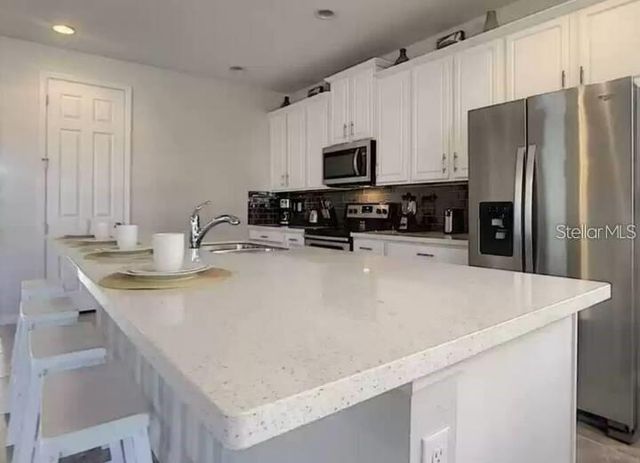 9033 FLAMINGO KEY WAY, Kissimmee, FL 34747