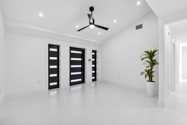 1410 Beta Court N, Lake Clarke Shores, FL 33406