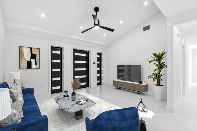 1410 Beta Court N, Lake Clarke Shores, FL 33406