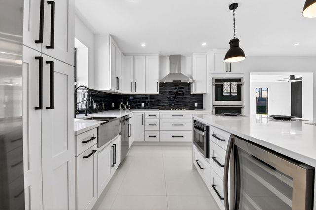 1410 Beta Court N, Lake Clarke Shores, FL 33406