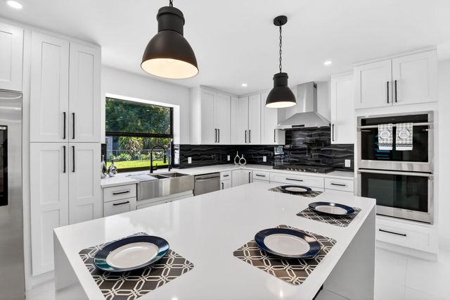 1410 Beta Court N, Lake Clarke Shores, FL 33406