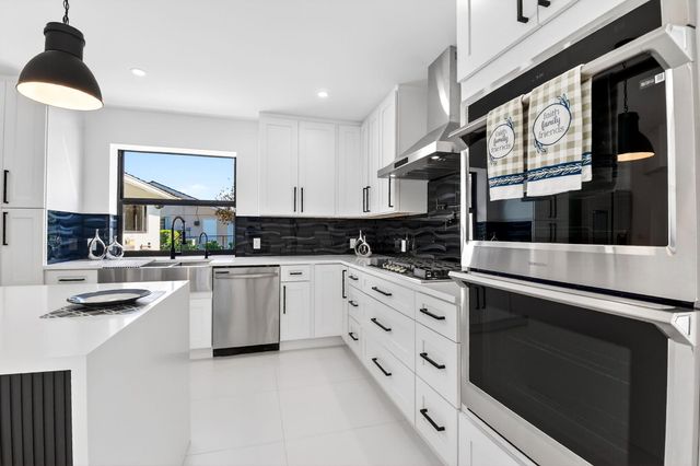 1410 Beta Court N, Lake Clarke Shores, FL 33406