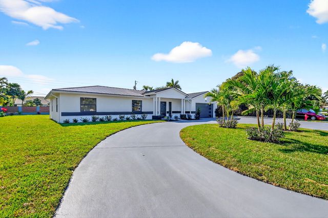 1410 Beta Court N, Lake Clarke Shores, FL 33406