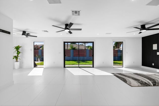 1410 Beta Court N, Lake Clarke Shores, FL 33406