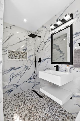 1410 Beta Court N, Lake Clarke Shores, FL 33406