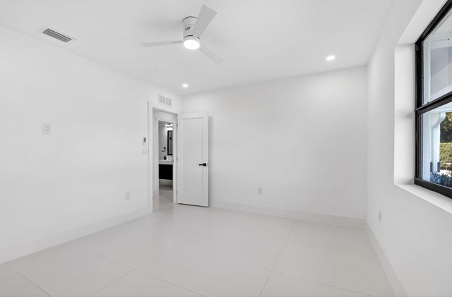 1410 Beta Court N, Lake Clarke Shores, FL 33406