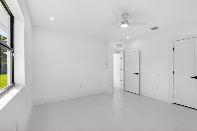 1410 Beta Court N, Lake Clarke Shores, FL 33406