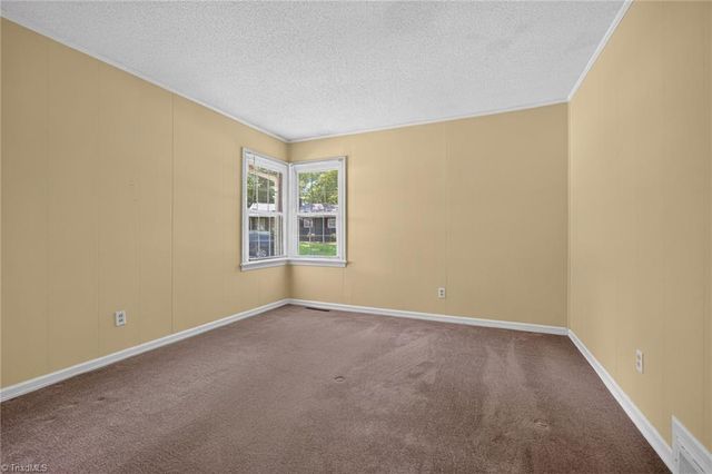 1115 E Willowbrook Drive, Burlington, NC 27215